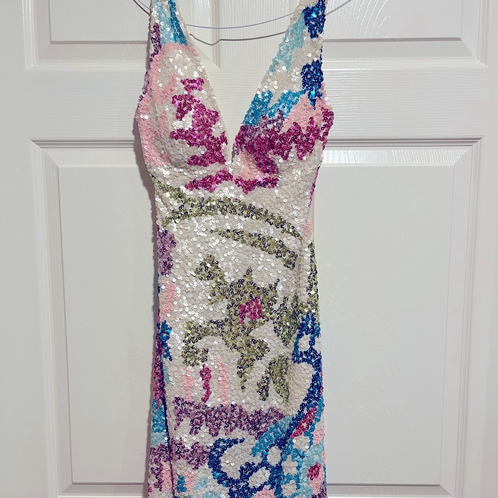Multi colored sequin mini dress. Size Small. Comes with accessories